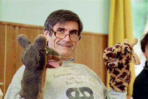 Dr. Marshall Rosenberg demonstrating NVC with jackal and giraffe puppets